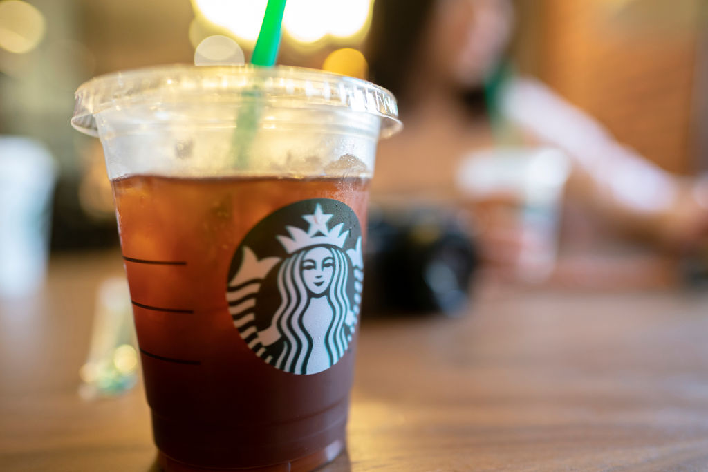 Ice Starbucks coffee on table. On April 26, Starbucks...