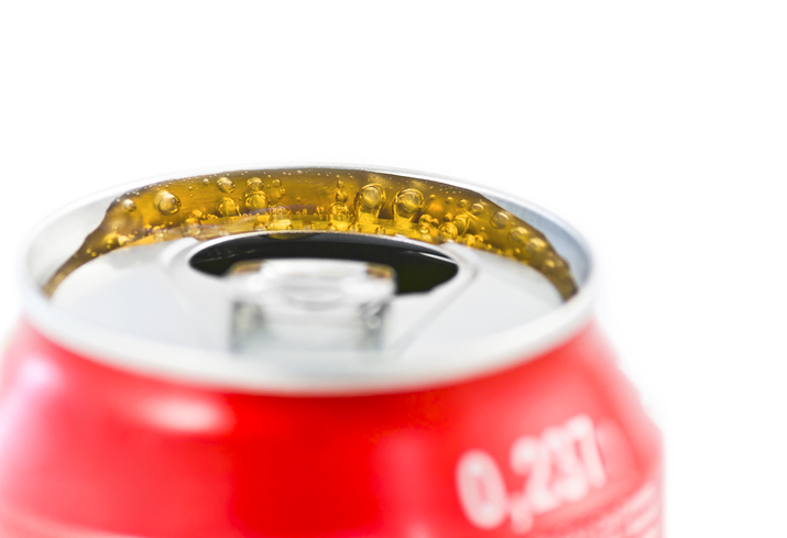 Close-up of red container against white background