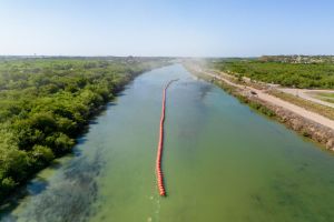 Texas Deploys Buoys Into Rio Grande River To Deter Migrants