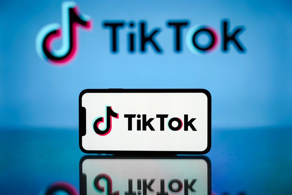 In this photo illustration, the TikTok logo is seen...