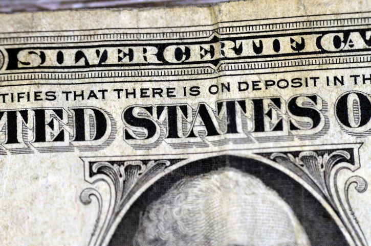 A detailed closeup of the Obverse side of 1 one dollar bill banknote series 1935 with the portrait of president George Washington, old American money banknote, vintage retro, United States of America