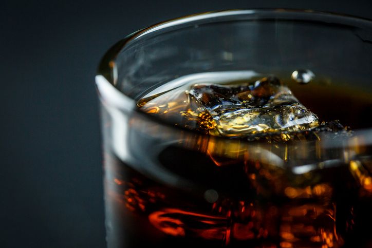 Cold Pepsi and cola with ice in a glass
