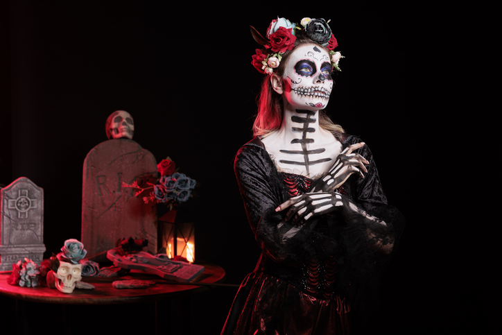 Lady wearing gothic corpse makeup for Day of the Dead event