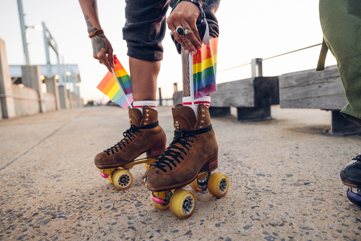 Quad skates with rainbow flags