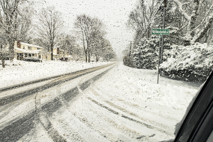 Car Driver POV While Turning Onto Winter Country Road