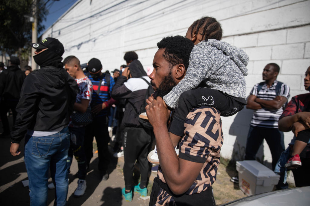 Migrants stranded in Mexico City wait to regularize their migratory status