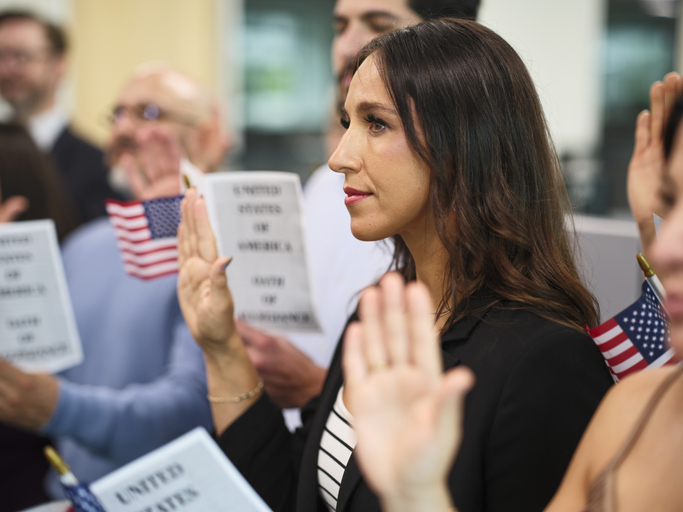 Group of People Taking the USA Naturalization Oath of Allegiance