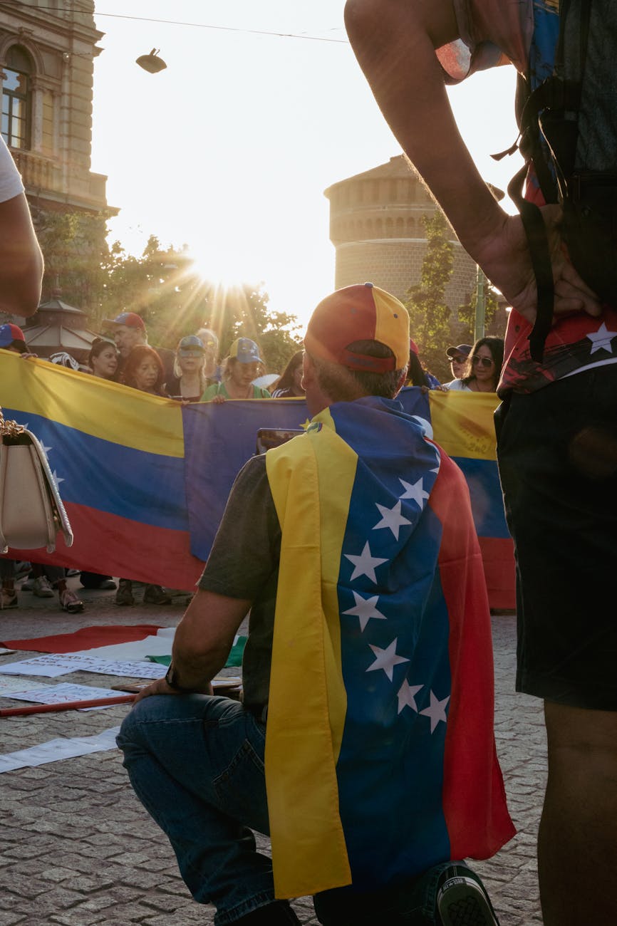 a man with a venezuela flag on his back