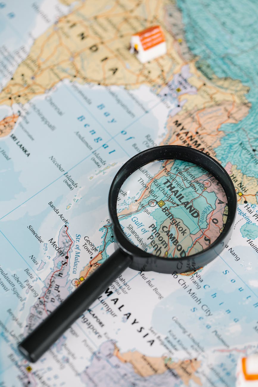 magnifying glass on a world map