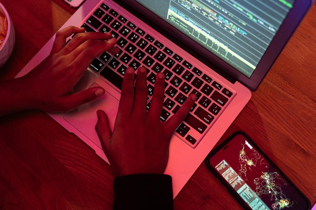 close up shot of a person using a laptop